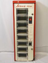 A mid-20th century French, 'Servez Vous' food vending machine - no keys. H116cmxW38.8cmxD25.5cm This