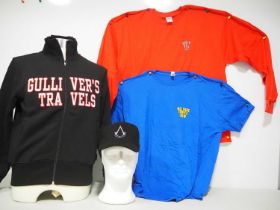 A group of four crew clothing items comprising: ASSASINS CREED - cap together with GULLIVERS TRAVELS