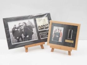 A pair of framed and glazed film cels comprising: U2 'Pop' limited edition 38/1000 framed and glazed