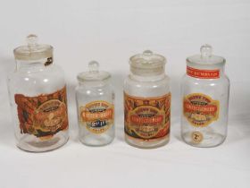A group of Brown Brother's glass sweet jars to include Bitter Drops and Mint Humbugs (4)