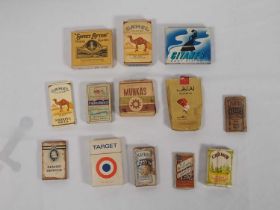 A collection of 20th century cigarette packets including; Camel filters, Munkas, Senior Service,