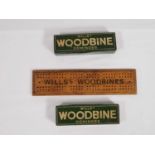 Two sets of Will's Woodbine Dominoes and a Woodbine Cribbage board