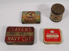 A collection of mid-20th Century tobacco tins including branded Players Navy Cut, 2 tobacco and 2