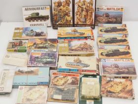 A quantity of mostly 1:76 scale unbuilt plastic kits by AIRFIX, TAMIYA and others - contents