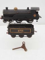 A HORNBY O gauge No.2 4-4-0 clockwork steam locomotive in LMS black livery - some repainting to loco