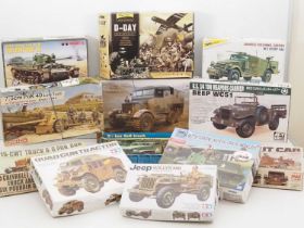 A group of unbuilt plastic kits for military vehicles - mostly in 1:72 scale - by HELLER, TAMIYA and