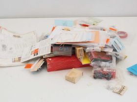 A crate containing a large quantity of OO gauge model railway accessories including items by