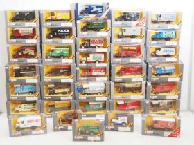 A large group of CORGI CLASSICS diecast cars and vans - VG in G/VG boxes (36)