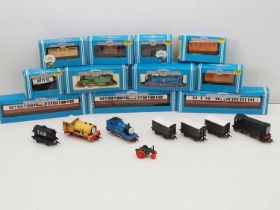 A group of HORNBY OO gauge 'Thomas the Tank Engine' series locomotives and rolling stock to