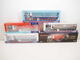 A group of CORGI 1:50 scale diecast articulated lorries in various liveries to include two Pollock