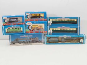 A group of HORNBY OO gauge 'Thomas the Tank Engine' series locomotives and rolling stock to