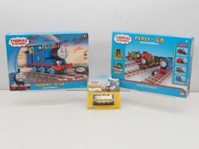 A group of THOMAS THE TANK ENGINE toys comprising a pair of Japanese import Lego compatible Thomas