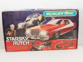 A SCALEXTRIC SPORT 'Starsky and Hutch' slot racing set - appears complete - VG in G box