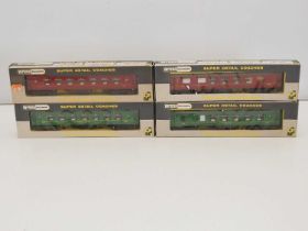 A group of WRENN OO gauge Pullman cars in Southern Railways green and LMS maroon liveries - VG in