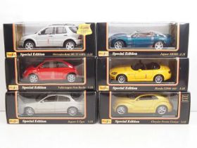 A MAISTO trade box containing a mixed selection of 1:18 scale diecast cars in as new condition -