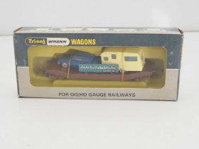 A WRENN OO gauge W4652P Low Mac wagon in Auto Distributors livery with car and caravan load - VG