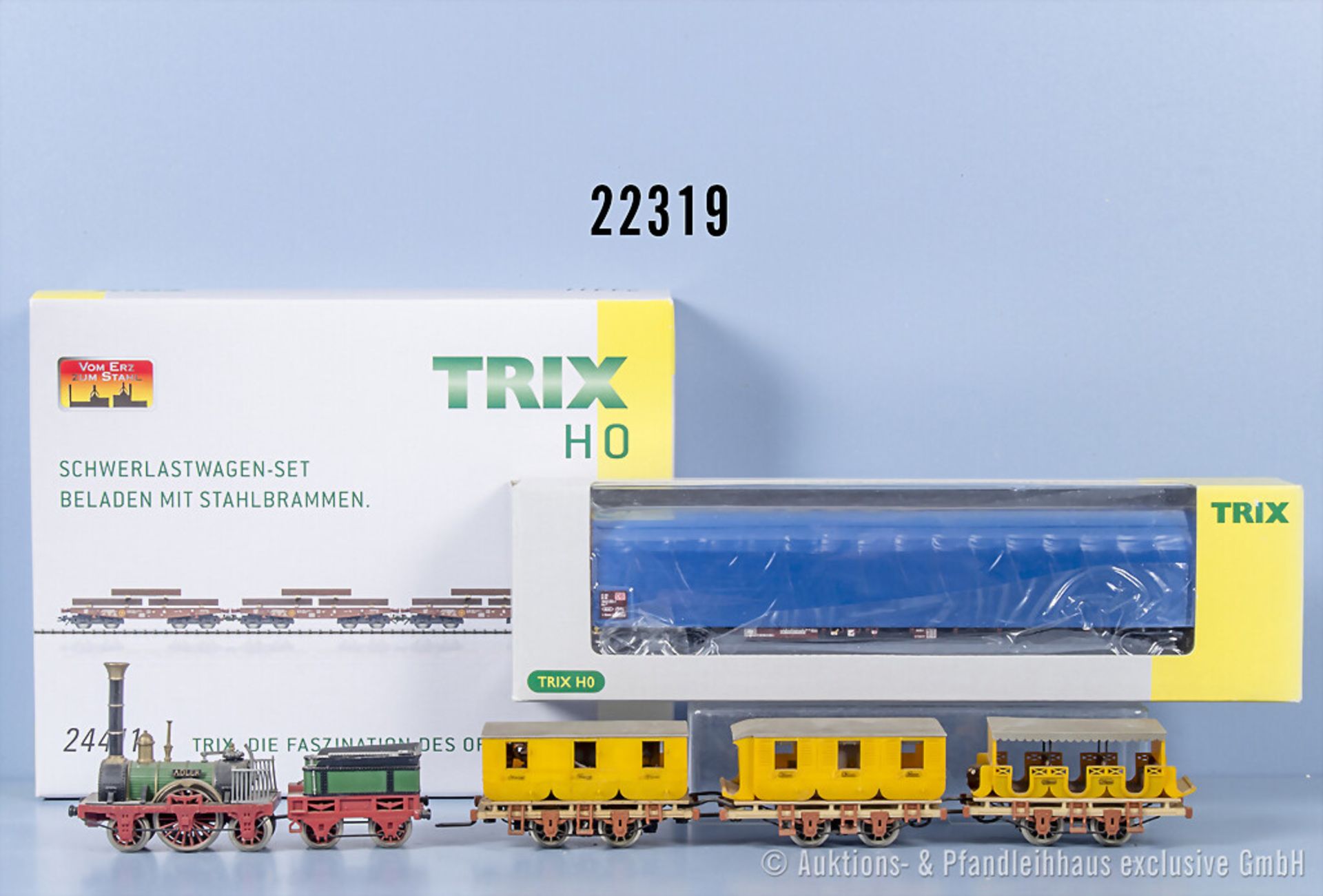 Trix International H0, dabei 4-teiliger Personenzug "Adler", 24411 Schwerlastwagenset ...