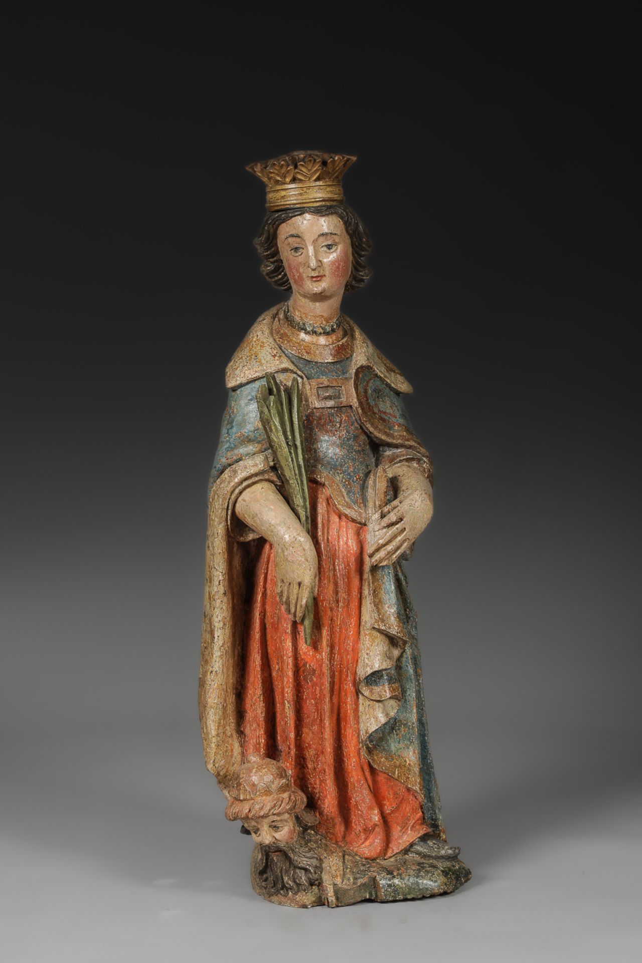 Sainte Catherine d'Alexandrie figurée debout chevauchant le visage Maximinius et tenant "la palme de