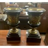 A PAIR OF 19TH C. BLACK SLATE & BRASS CLASSICAL SHAPED URNS -CLASSICAL FIGURES EMBOSSED