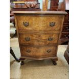 A WALNUT 3 DRAWER CHEST OF SERPENTINE DESIGN - MODERN REPRODUCTION