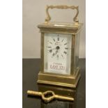 A BRASS CARRIAGE CLOCK MARKED RAPPORT FONDEE 1900 FRANCE WHITE DIAL WITH ARABIC & ROMAN NUMERALS