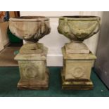 A PAIR OF STONEWARE CLASSICAL GARDEN URS ON PEDESTAL SWAG DECORATION 72CM HIGH