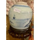 A 19TH C CHINESE BLUE & WHITE GLAZED STONEWARE GINGER JAR SHOWING A VILLAGE SCENE H: 17CMS