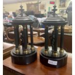 PAIR OF DOMED ARCHITECTURAL TEMPLE MODELS IN BLACK MARBLE WITH BRONZE FIGURINES TO CENTRE, AND BRASS