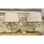 A PAIR OF BRASS FRENCH EMPIRE STYLE TABLE LAMP WITH SWAG EMBELLISHMENTS AND SHADE