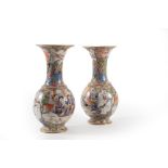 A pair of polychrome porcelain vases, oriental style, 19th century