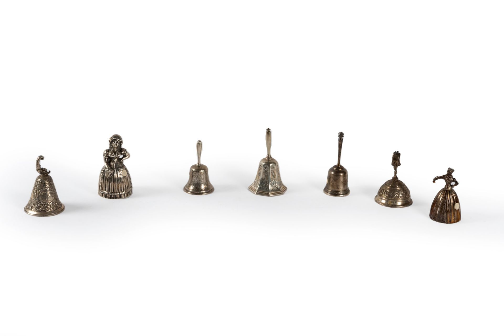 Lot consisting of seven bells in sterling silver, late 19th century - early 20th century