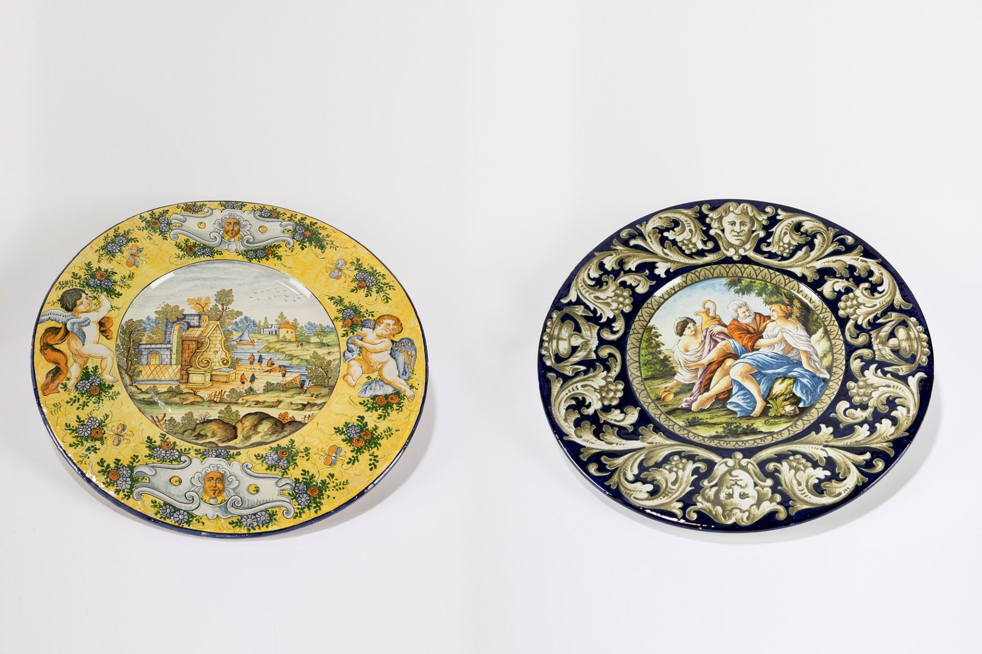 Two large plates in polychrome majolica, late 19th century