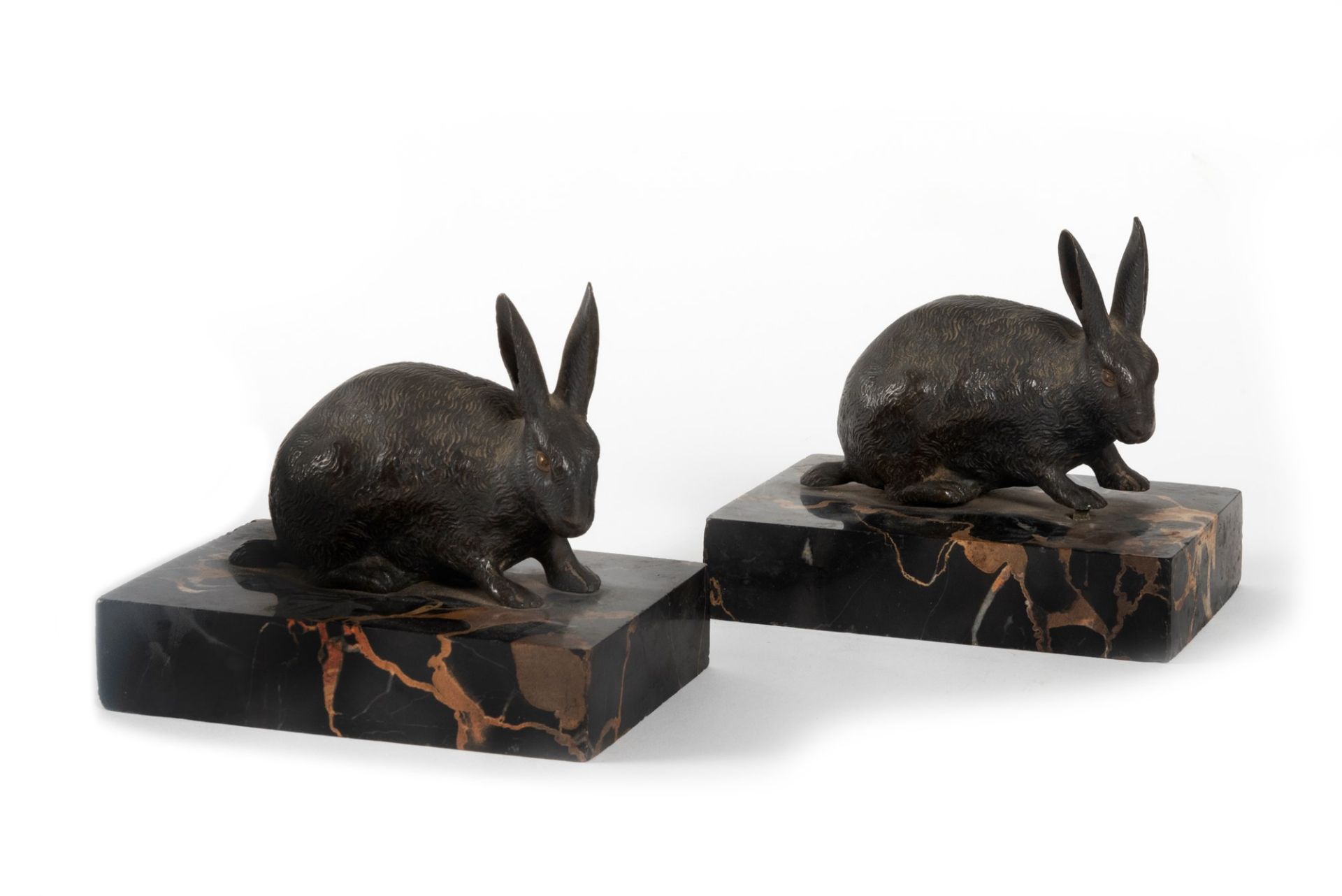 Pair of bronze sculptures depicting hares, 20th century