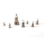 Lot consisting of seven silver-plated metal bells, 19th-20th centuries