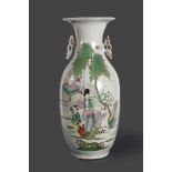 A porcelain vase decorated with a female figure, children in an extensive landscape, China, first ha