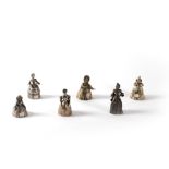 Lot consisting of six silver bells depicting female figures, 20th century
