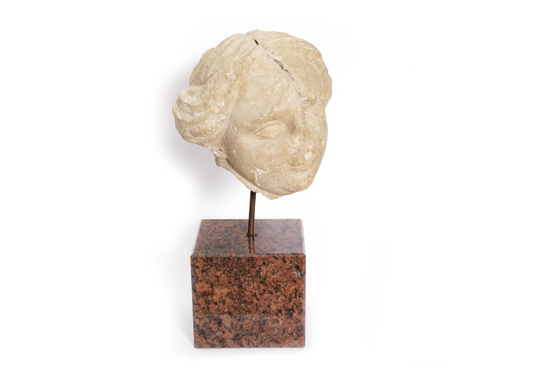 Ancient female head in marble