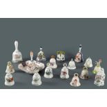 Lot consisting of seventeen bells in porcelain and white and polychrome majolica, 20th century