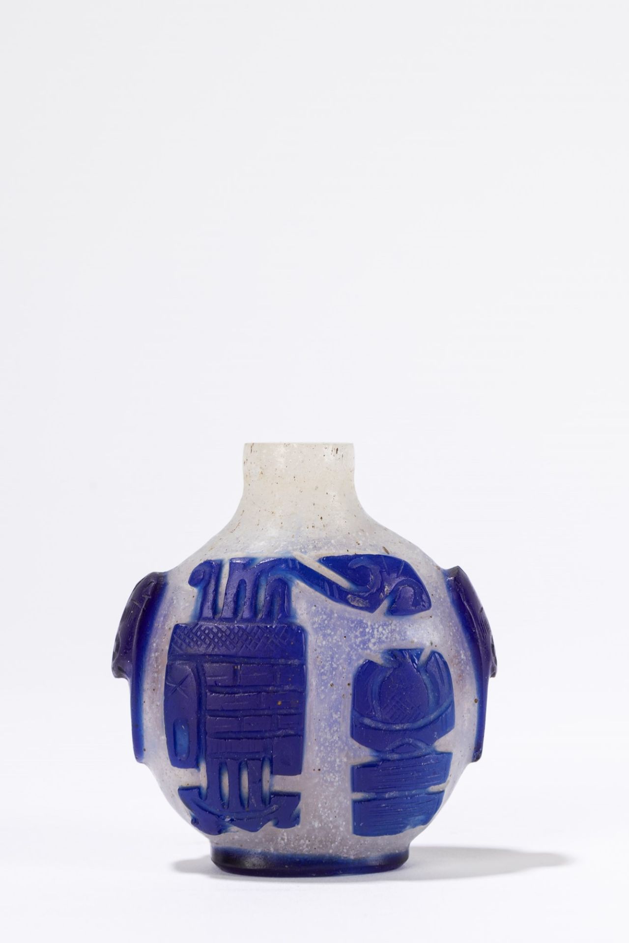 A white and blue glass snuff bottle. China, late 19th century