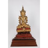 A gilt and lacquered papier-mâché Buddha. Thailand, early 20th century