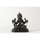 A dark patina bronze Vasudhara. Tibet, 19/20th century