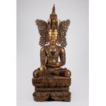 A lacquered and partial gilt wood Jambupati Buddha. Burma, early 20th century