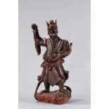 A carved wood warrior. China, 19th century