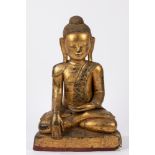 A gilt wood Buddha. South East Asia, 20th century