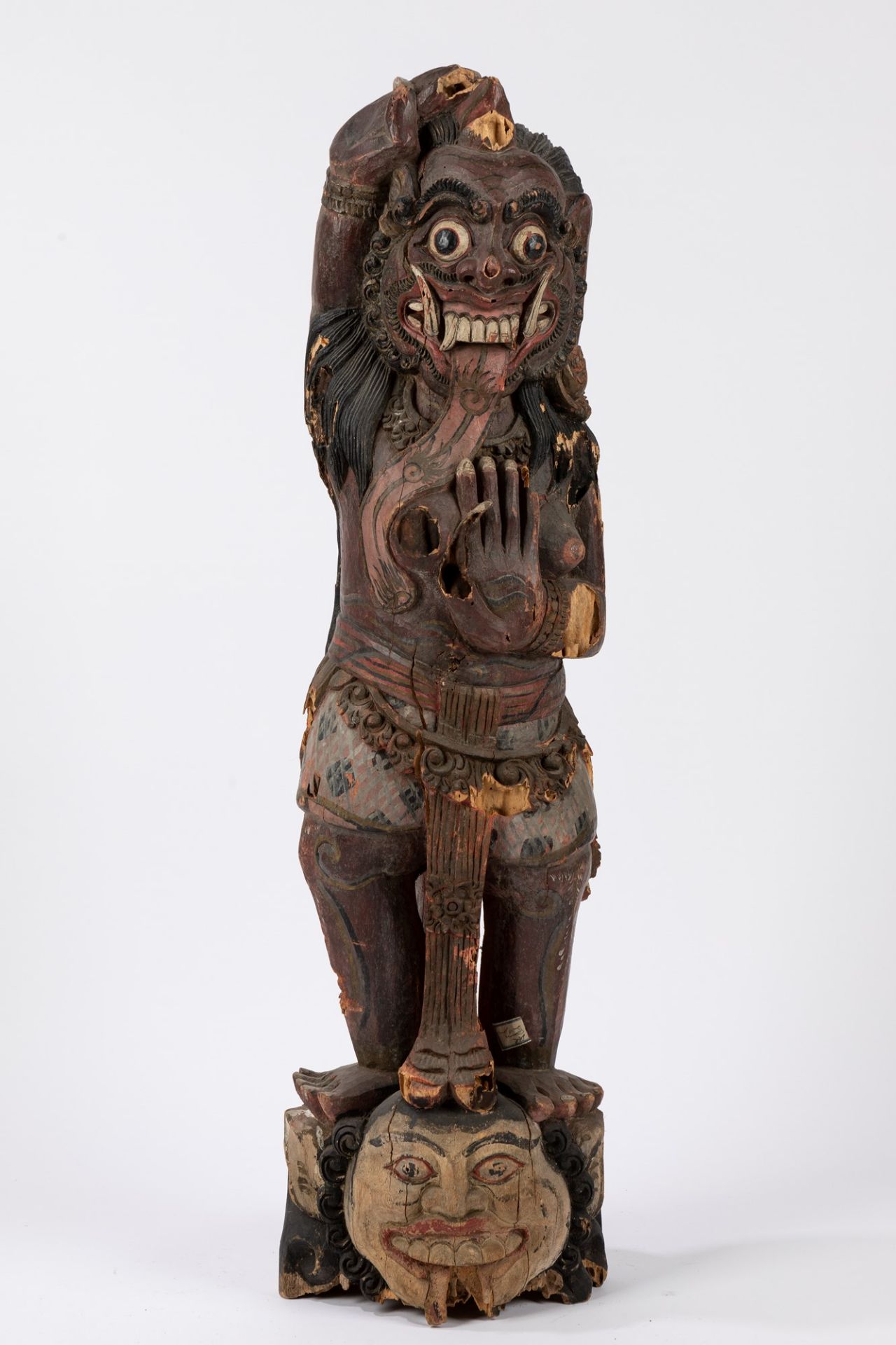 A carved wood sculpture of a demon. China/Tibet, early 20th century