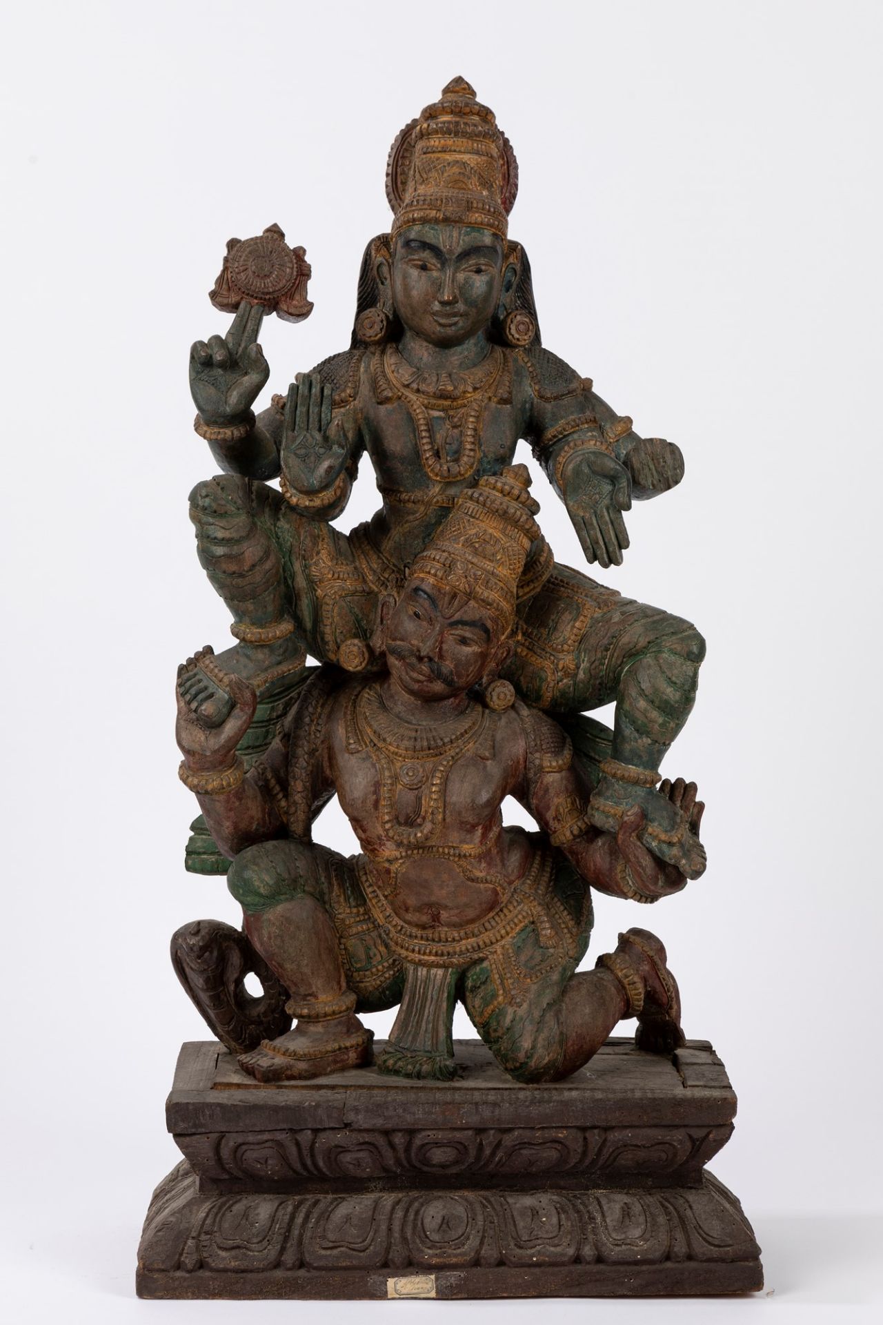 A polycrome wooden sculpture depicting Parvati and Shiva. 20th century