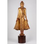 A Mandalay style wood Buddha. Burma, early 20th century