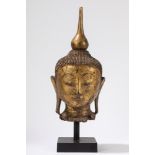 A lacquered and gilt wood head of Buddha. Birmania, 19th century