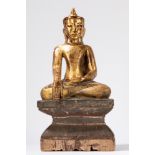 A gilt and lacquered wood seated Buddha. Burma, early 20th century
