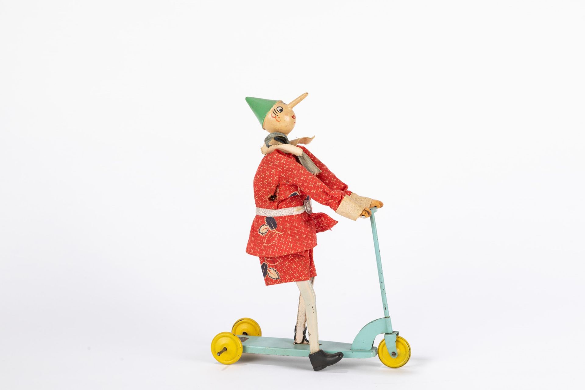 Sigi - Pinocchio on tricycle